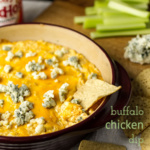 Quick Buffalo chicken dip is ready in less than thirty minutes and it's sure to be a hit with all the guests at your next party! | recipe from Chattavore.com