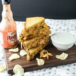 This Buffalo chicken grilled cheese is easy, delicious, and just a little bit indulgent. It's a great simple weeknight dinner! | recipe from Chattavore.com