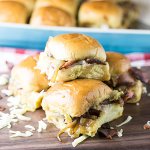 Tiny party sandwiches with bacon, melted cheese, caramelized onions, and a buttery sauce will make all your guests smile-if you choose to share. | Recipe from Chattavore.com