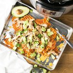 Slow cooker beer chicken is probably the best version of pulled chicken I could think of. It's delicious on its own or piled on a sandwich (or fries)! | Recipe from Chattavore.com
