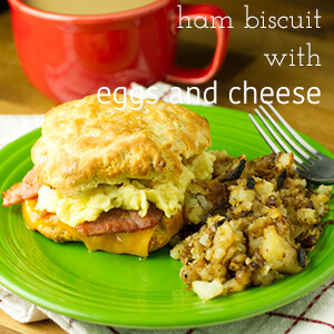 How can you go wrong with a giant ham biscuit? Country ham, scrambled eggs, and cheddar cheese make an out of this world breakfast sandwich! | recipe from Chattavore.com