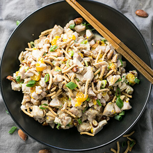 Sesame chicken salad has a sweet, creamy honey-sesame dressing, crunchy almonds, and sweet Mandarin oranges. It's a delicious way to do chicken salad! | recipe from Chattavore.com