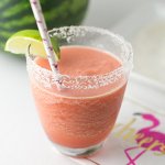This frozen watermelon margarita is like summer in a salty sugar-rimmed glass! For the kids and teetotalers, a non-alcoholic version is included! | Recipe from Chattavore.com