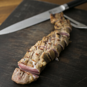 This grilled, sweet tea brined pork tenderloin is an amazingly simple and delicious weeknight dinner! It only takes about 15 minutes of active prep/cooking! | Grilling recipe from Chattavore.com