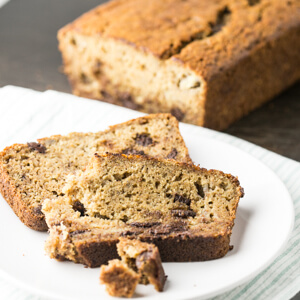 Banana beer bread with chocolate chips is a delicious and simple to make bread that is just sweet enough for dessert but you can eat it for breakfast too! | Recipe from Chattavore.com